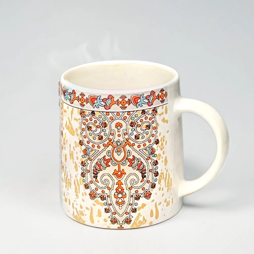 Golden Paisley Coffee Mug with Orange Accents